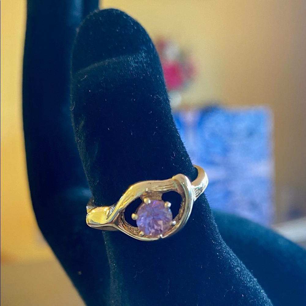 Gold Tone Ring with A Light Purple Stone